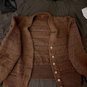 Brown knitted cardigan with buttons